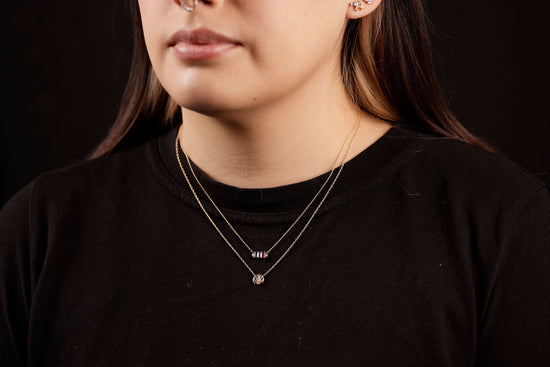 mini arc necklace on model