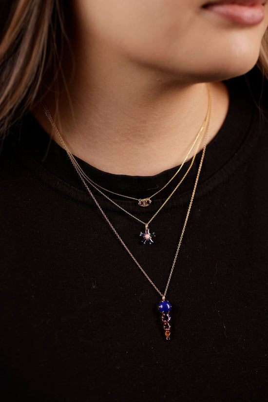gem spike necklace on model