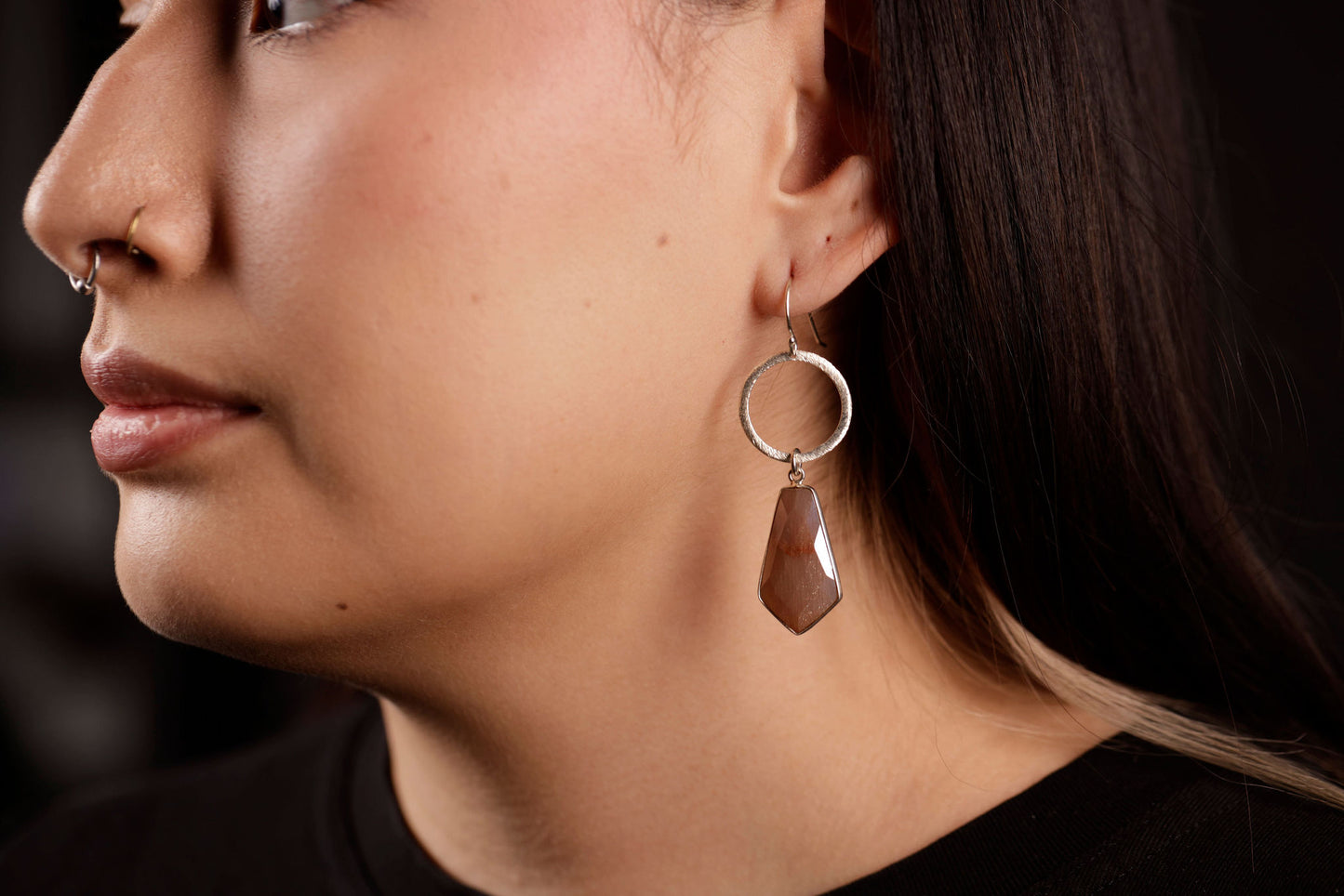 moonstone dangle earrings on model