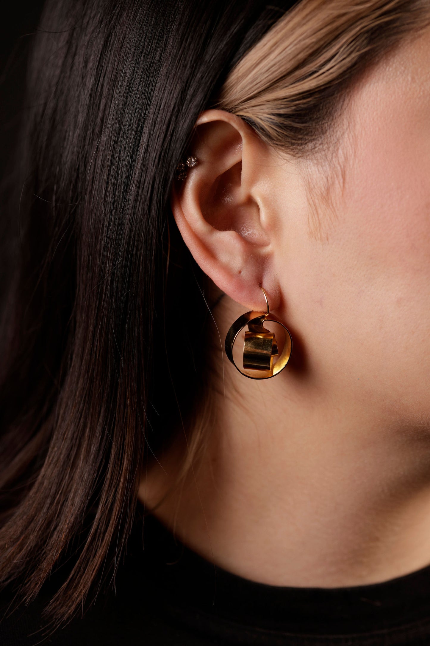 drop earrings on model