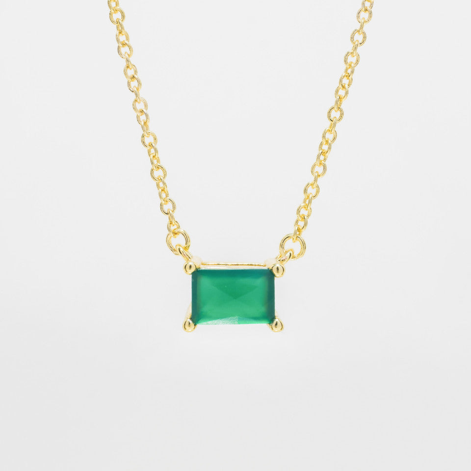 Nessa necklace in green on a white background