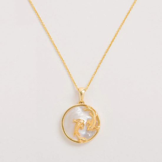 Pisces necklace on a white background