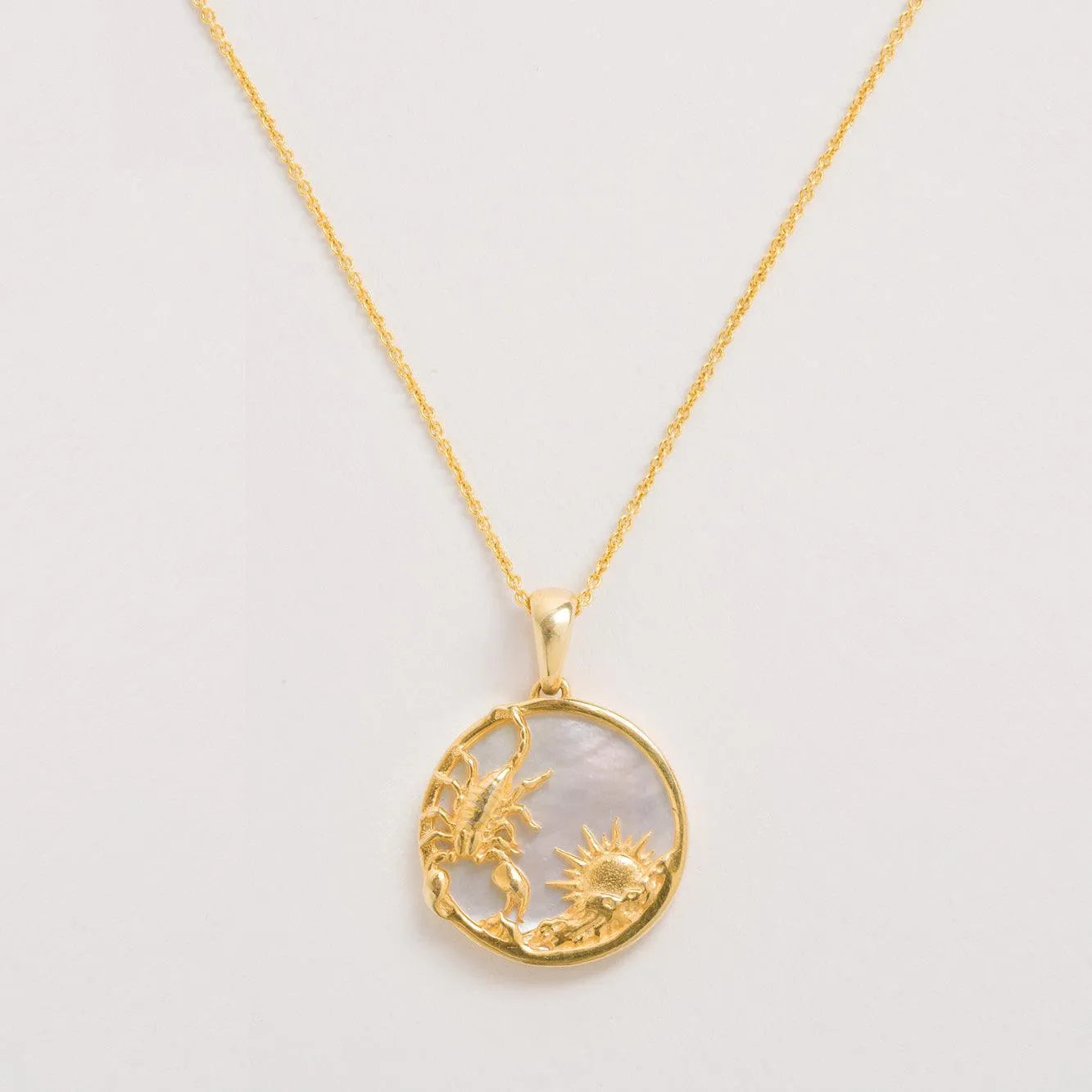 Scorpio necklace on a white background