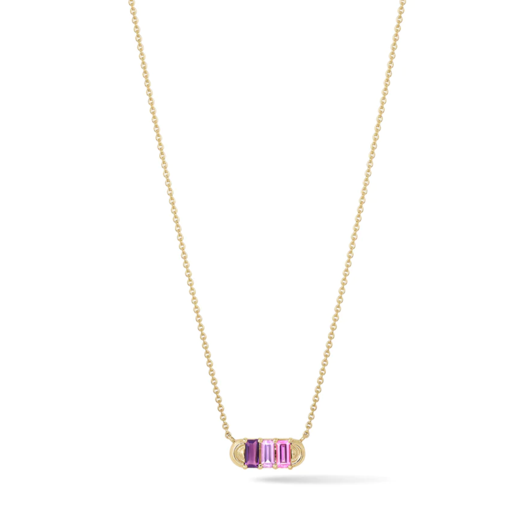 yellow gold pendant necklace with three baguette pink and purple sapphires and amethyst with gold arc details on each side. On a white background
