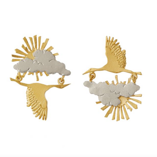 Load image into Gallery viewer, a gold stork dangles from a gold sun rising behind a sterling silver cloud on these earrings - on a white backgorund
