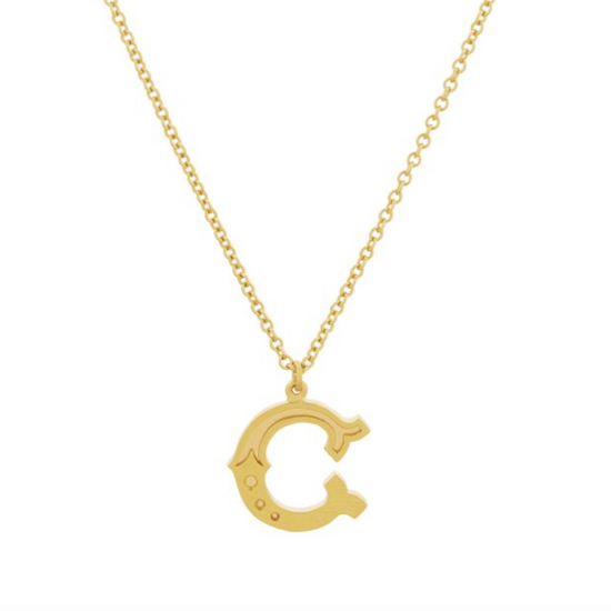 gold gothic c initial pendant necklace on a white background