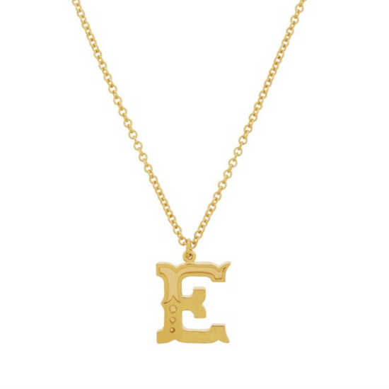 gold gothic e initial pendant necklace on a white background