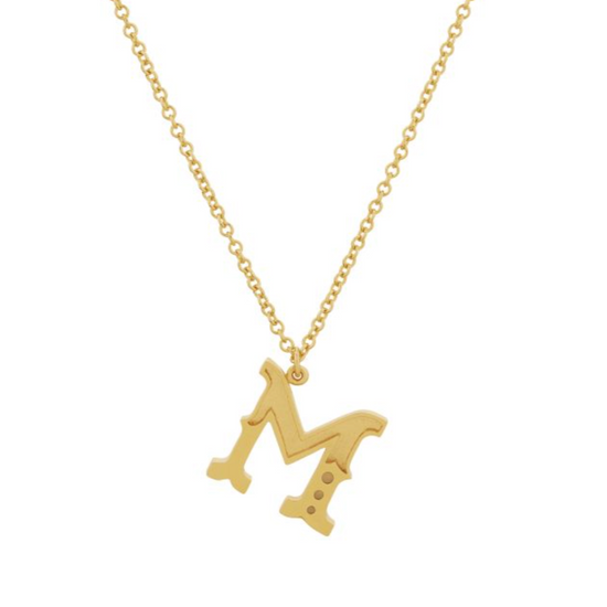 gold gothic m initial pendant necklace on a white background
