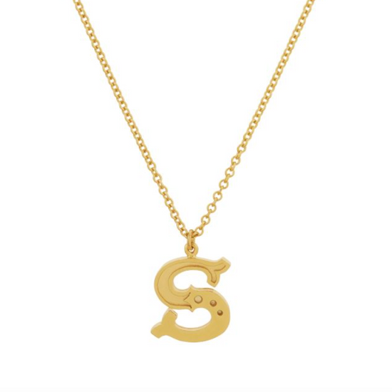 gold gothic s initial pendant necklace on a white background