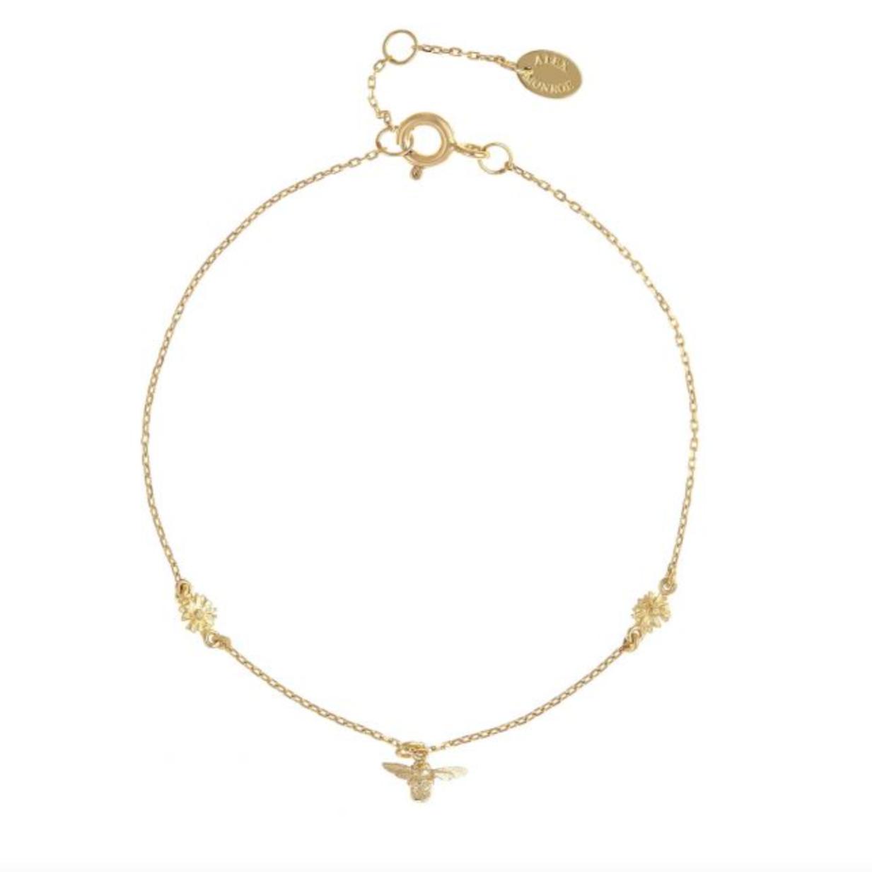 delicate gold chain bracelet with two flower and one bumble bee charm on a white backgorund