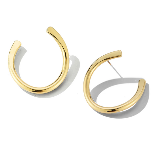 Load image into Gallery viewer, gold horse shoe shaped stud earrings on a white background
