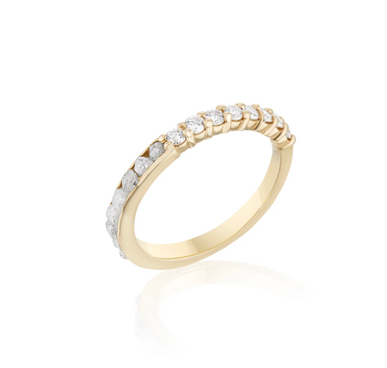 yellow gold band with half prong set brilliant round diamonds, and half channel set raw diamonds on a white background