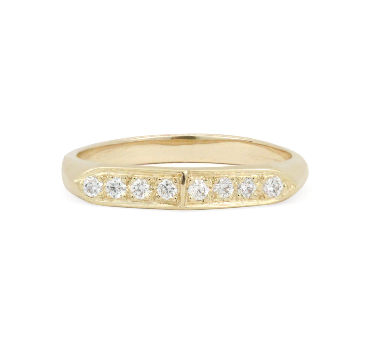 yellow gold tapered band with 8 round white diamonds on a white background