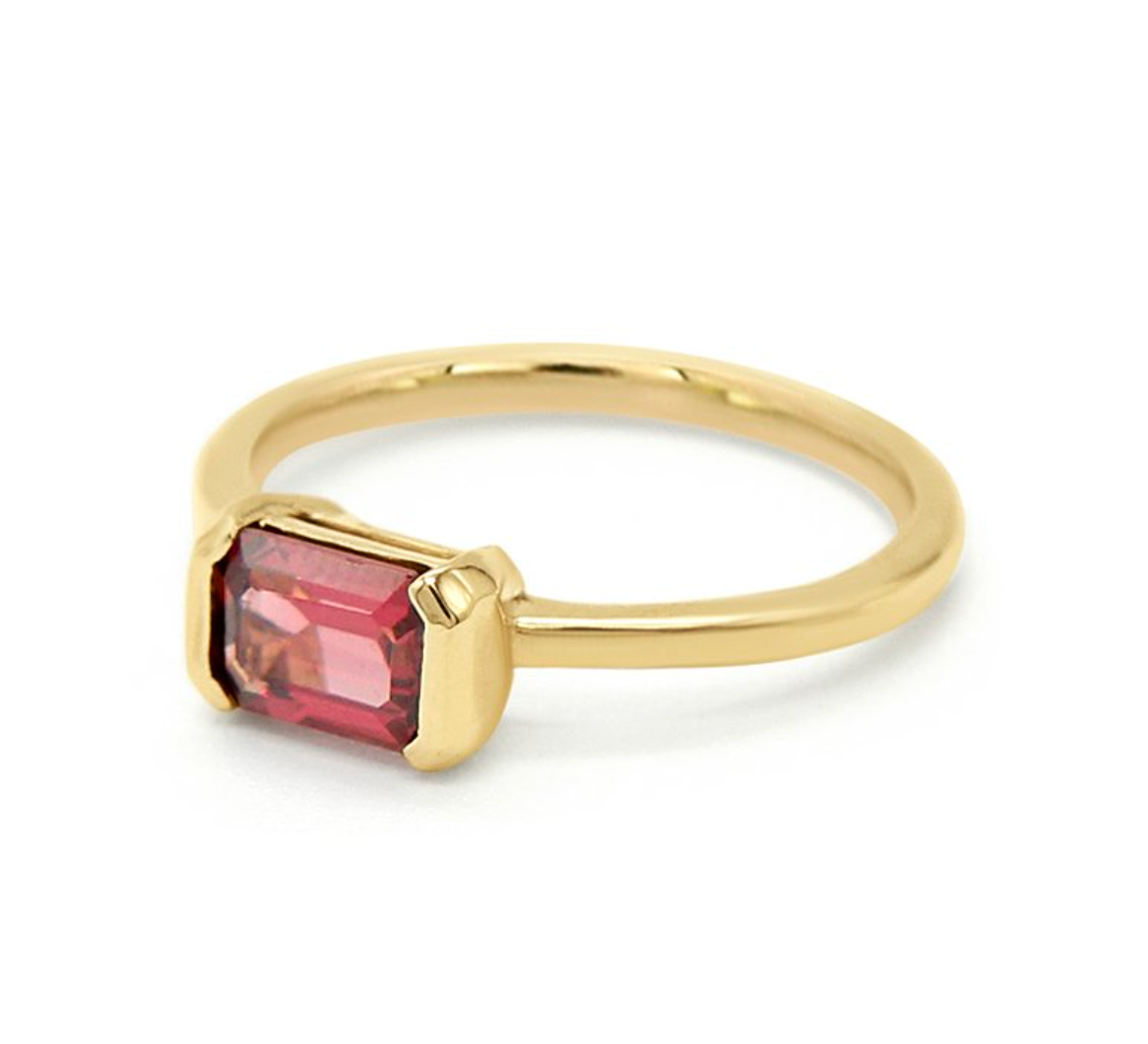 yellow gold vivant rhodolite garnet solitaire on white background