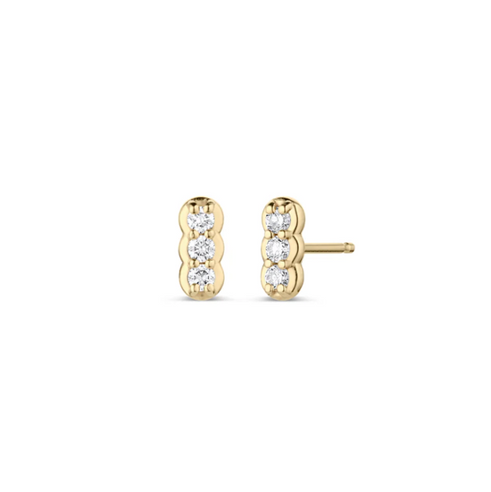 gold stud earrings with three round diamonds on each stud on a white background