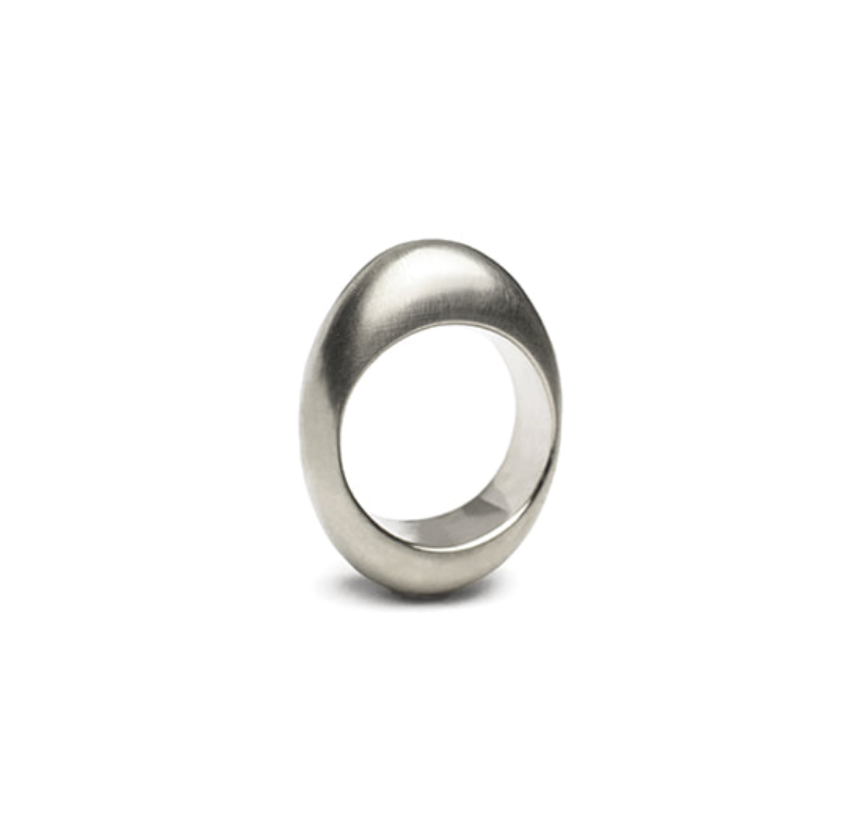 egg shaped domed silver ring on white background