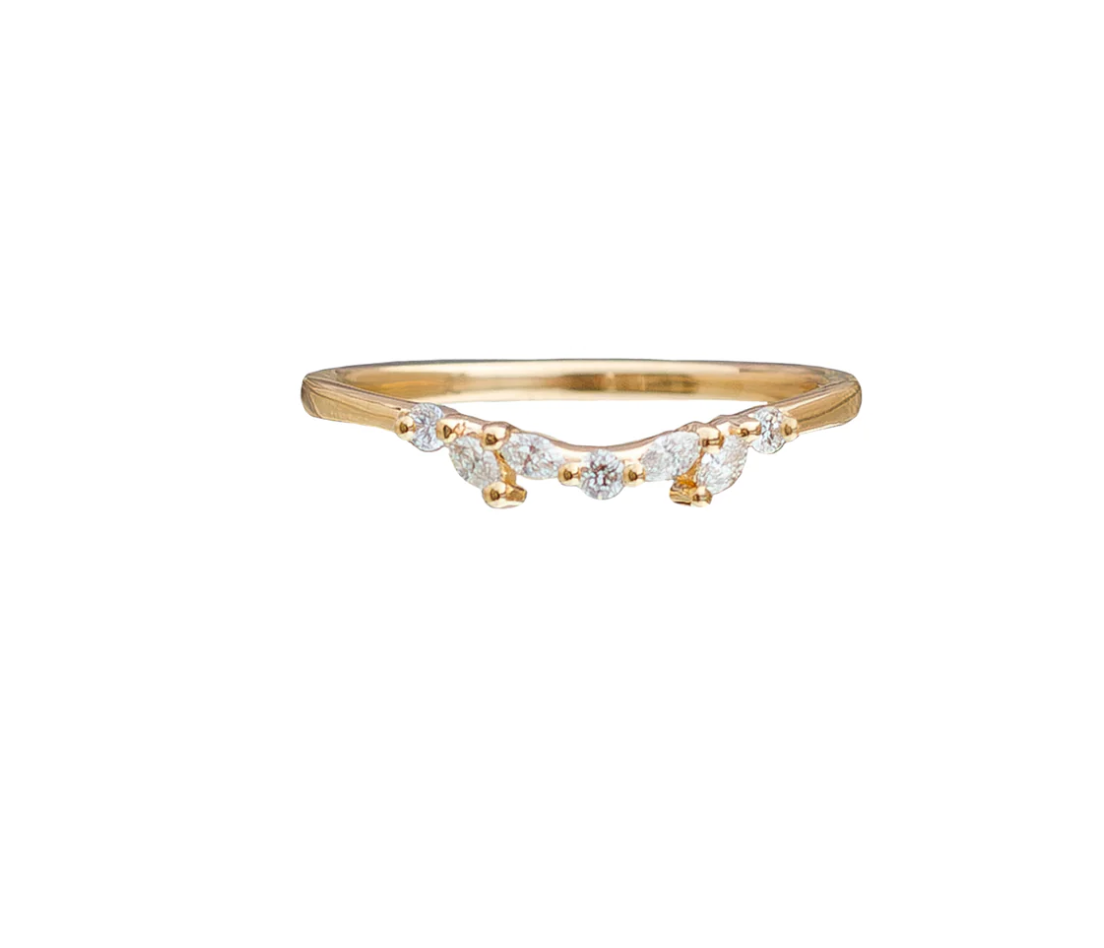 mixed diamond curved gold band on a white background