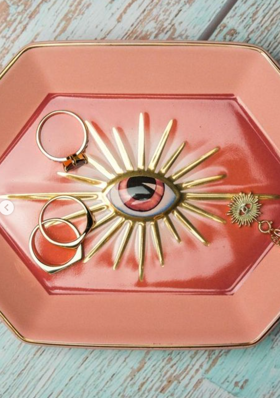 another close up view of the pink eye trinket dish holding jewelry