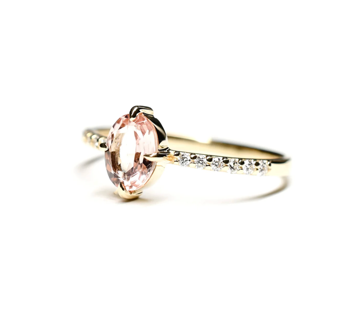 angled view of the pink tourmaline solitaire on white background