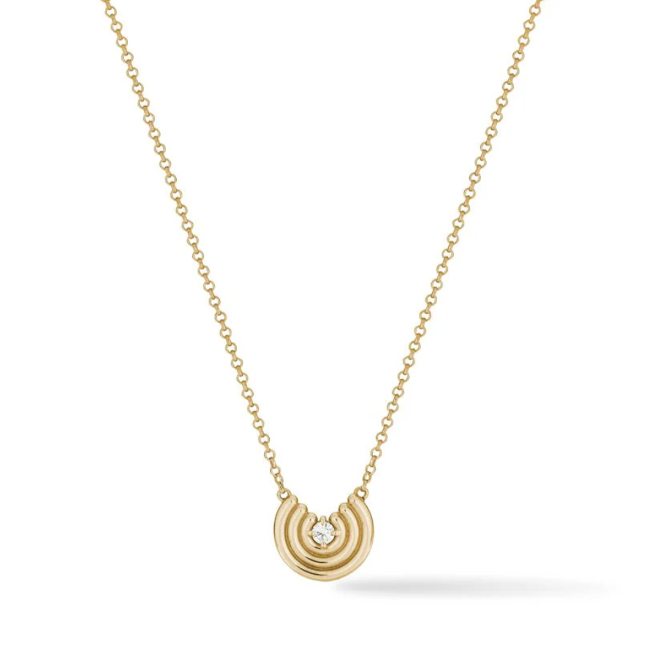 yellow gold semi circle necklace with round diamond center stone on white background