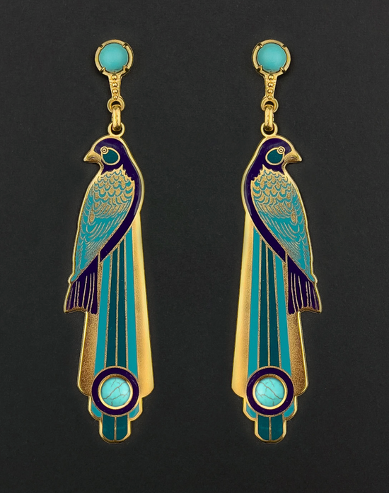 Bird-shaped earrings with gold, blue, and purple colors on a black background