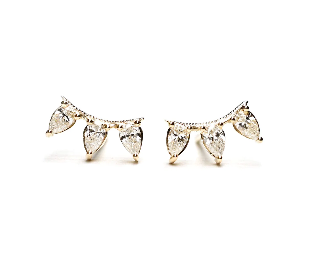 Pair of diamond earrings on a white background