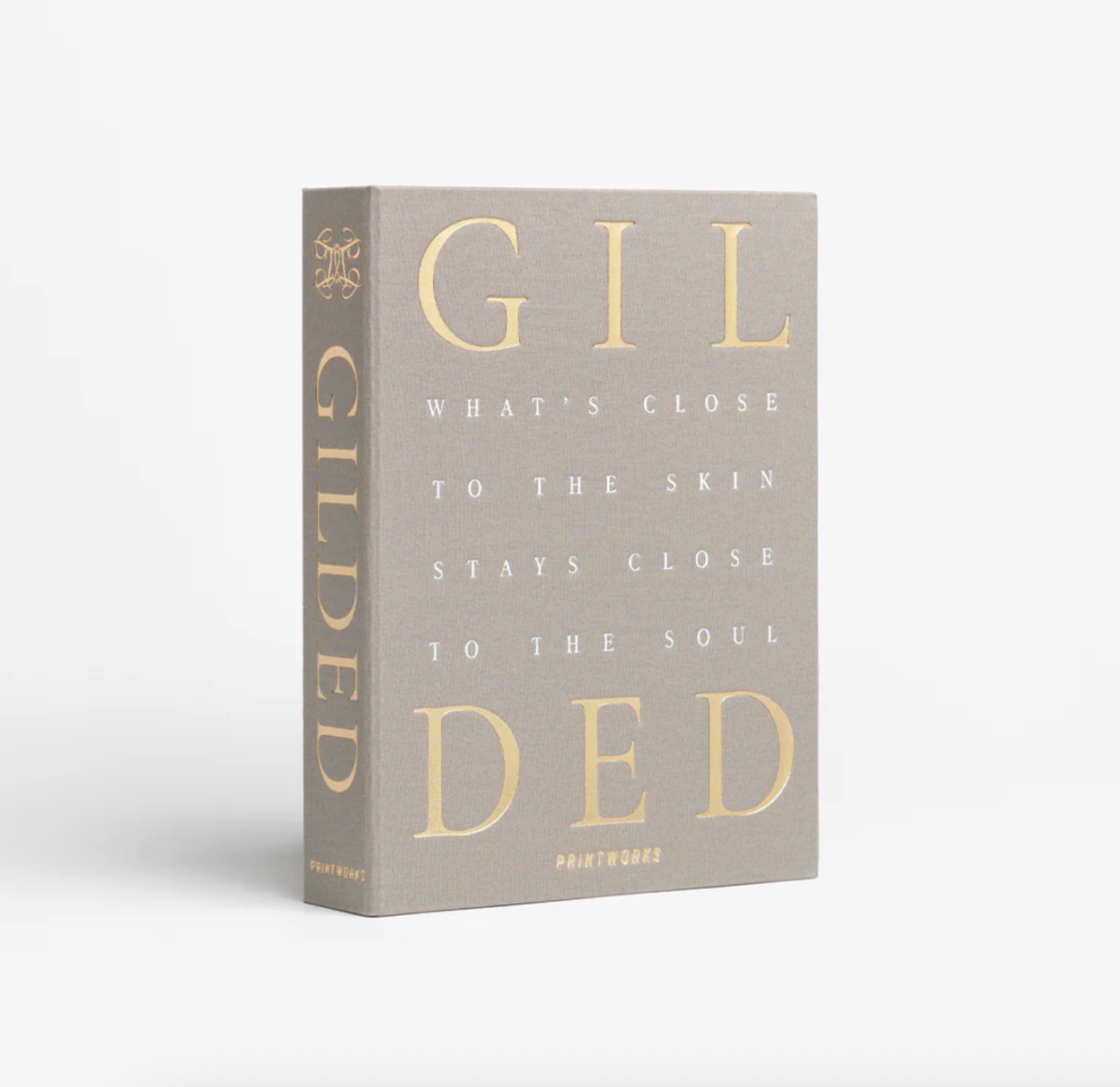 Jewelry box titled 'Gilded' with gold text on a gray background