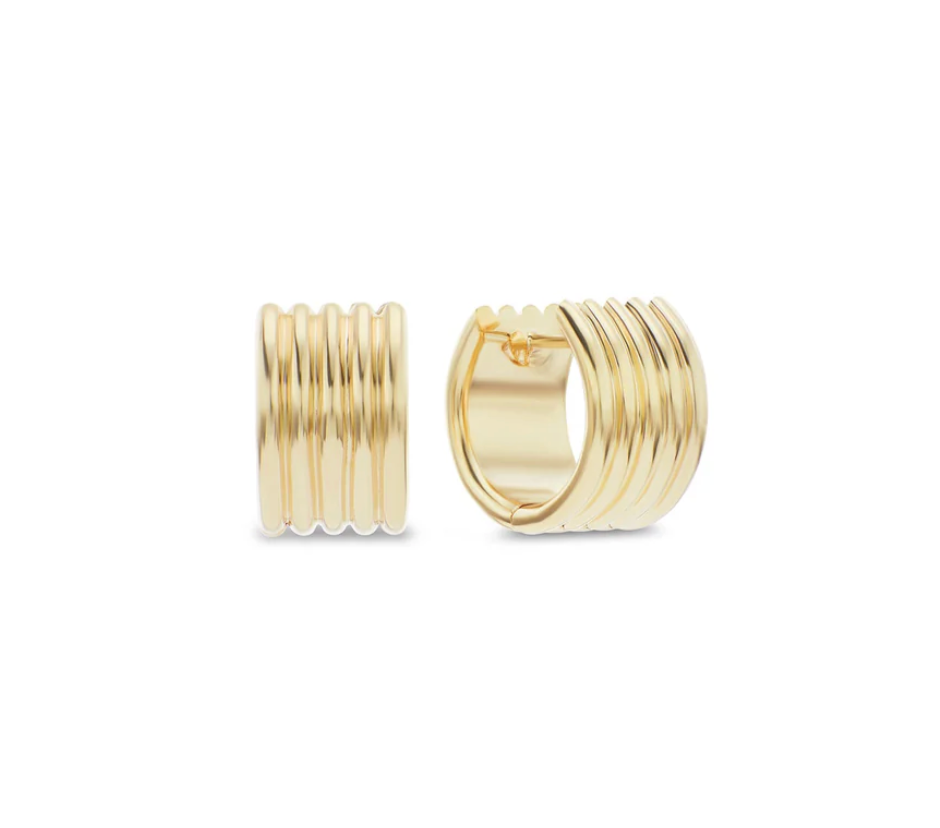 wide gold hoop earrings on a white background