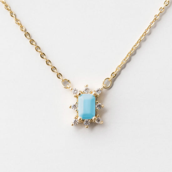 Load image into Gallery viewer, Solana necklace in light blue on white background

