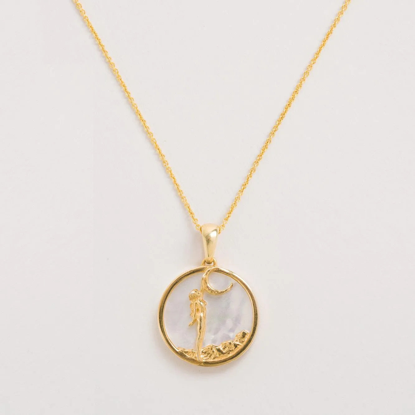 Virgo sign necklace on a white background