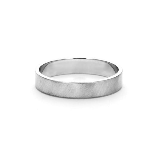 white gold flat wedding band with a brushed textured finish on a white background