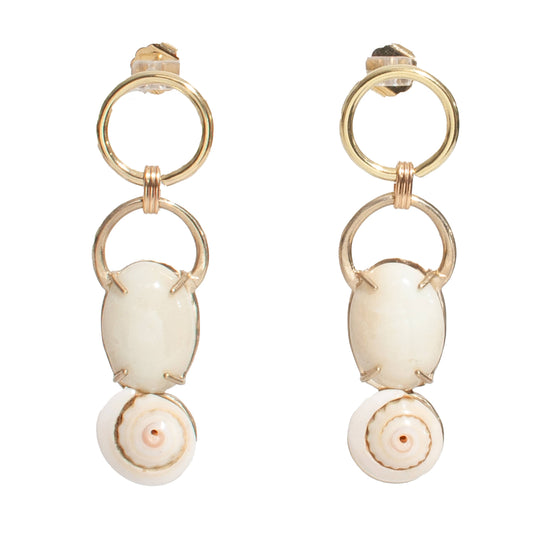 gold circle dangles with white glass stone and shell shaped stone on white background
