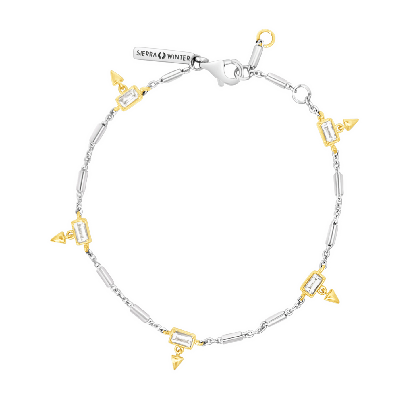 Silver and gold bracelet with geometric designs on a white background