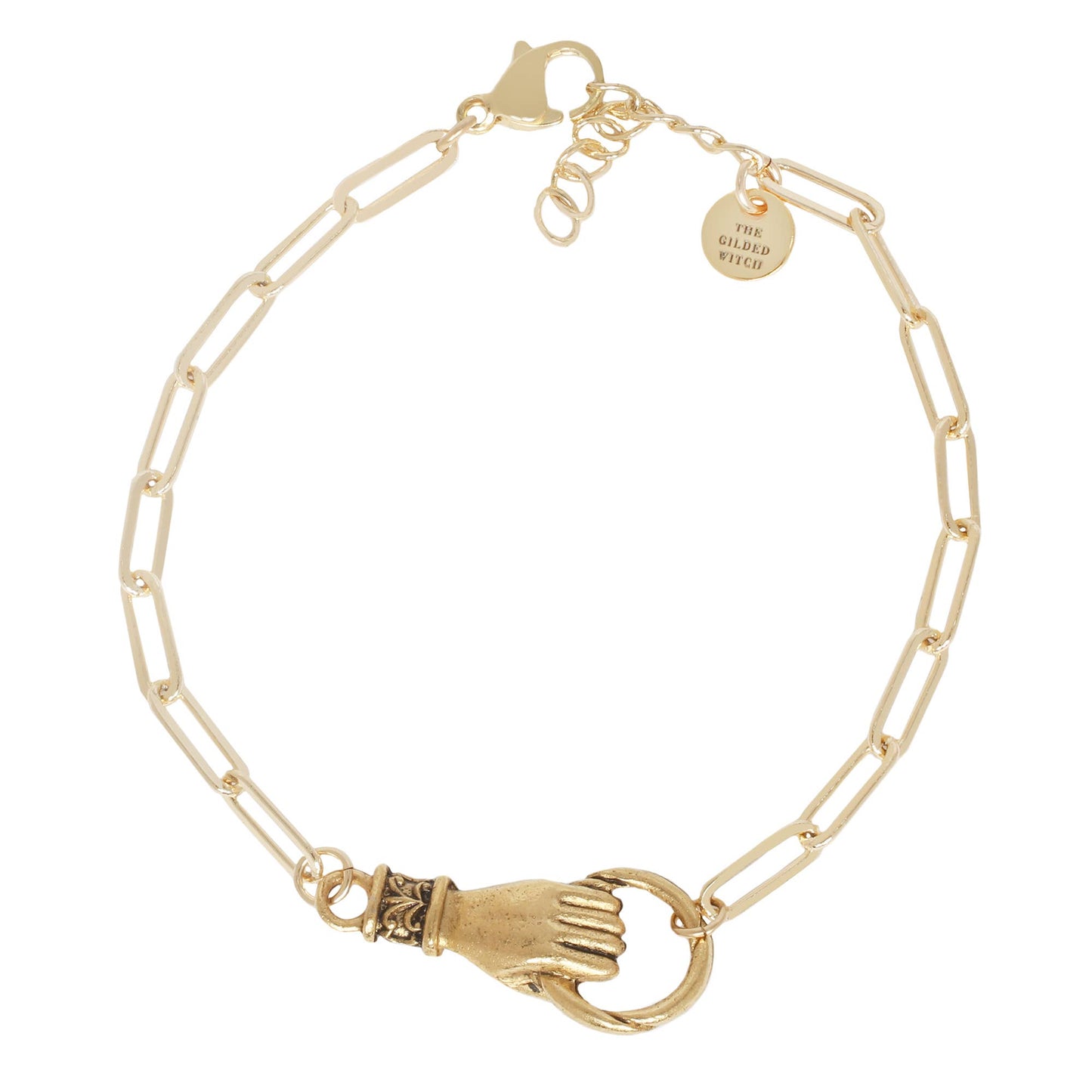Gold bracelet with hand holding a circle design on a white background