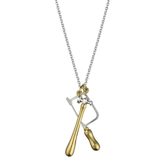 silver and gold charm necklace with a hammer and saw charm on a white background