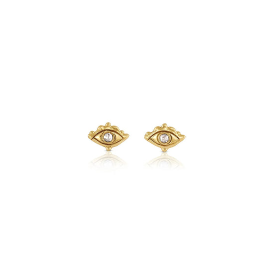 Gold eye-shaped earrings on a white background
