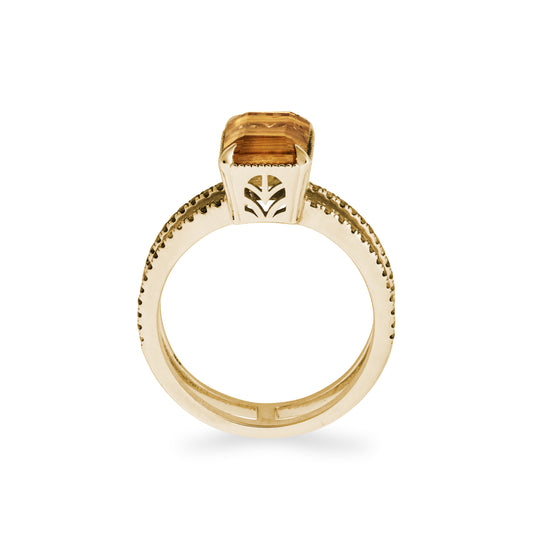 Side view of the double band Gisele ring with champagne diamonds and a gold rutile quartz on white background.