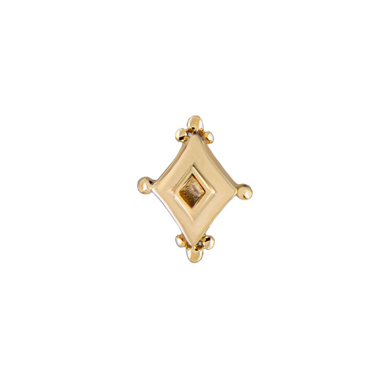 a diamond shaped gold stud with round gold accents on each corner on a white background