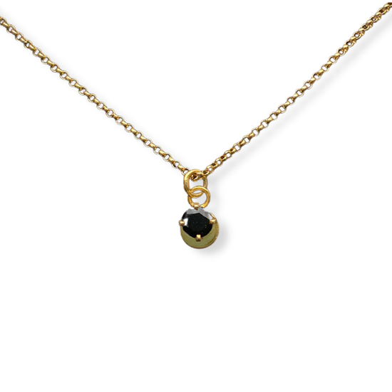 Gold vermeil necklace with onyx stone pictured on white background