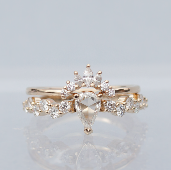 Load image into Gallery viewer, Rose cut pear shaped diamond ring with diamond cluster band, stacked with a diamond crown band, close up on light grey background..
