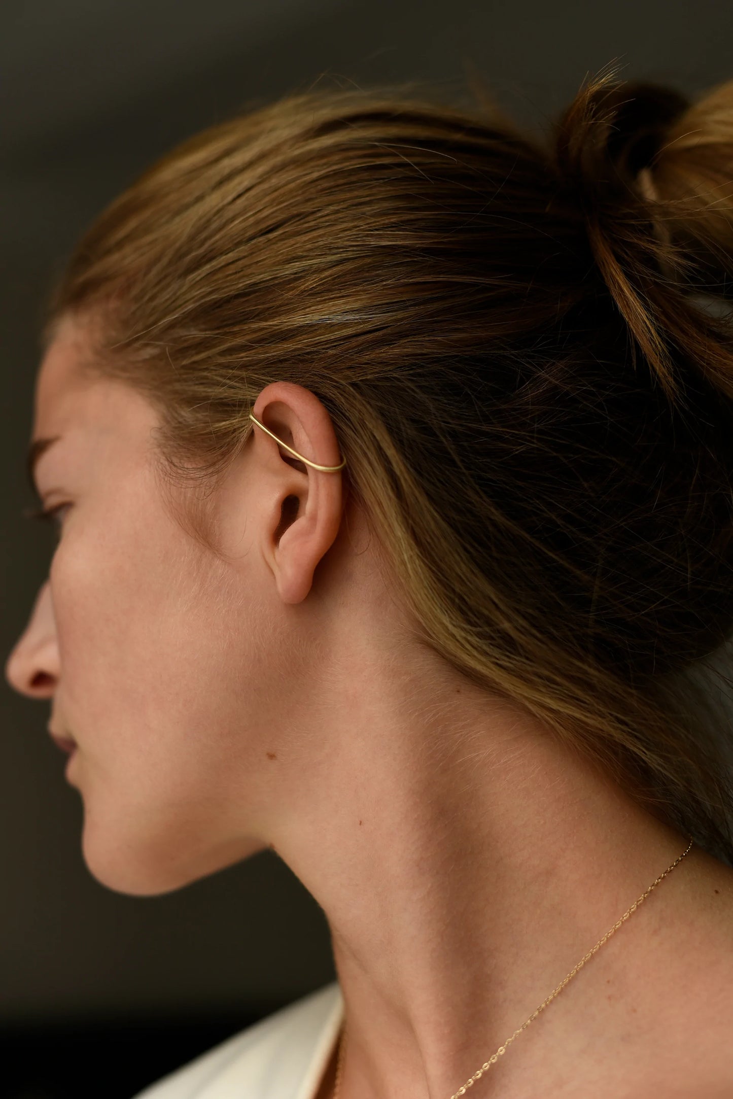 back view of model wearing the linea cuff earring