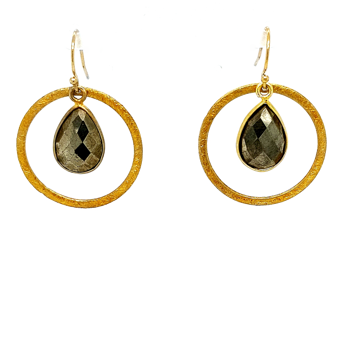 Gold pyrite earrings on white background