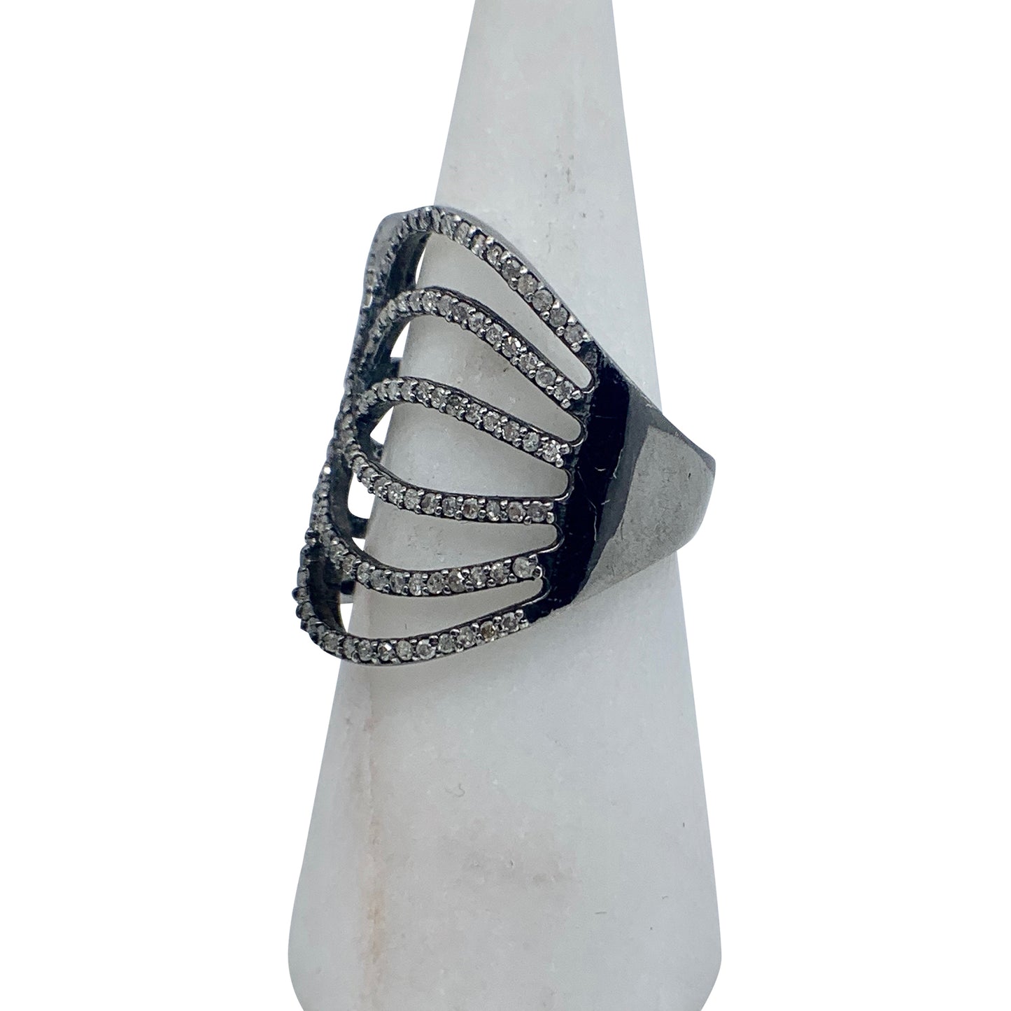 Side view of black ring with 6 tiers of grey diamonds