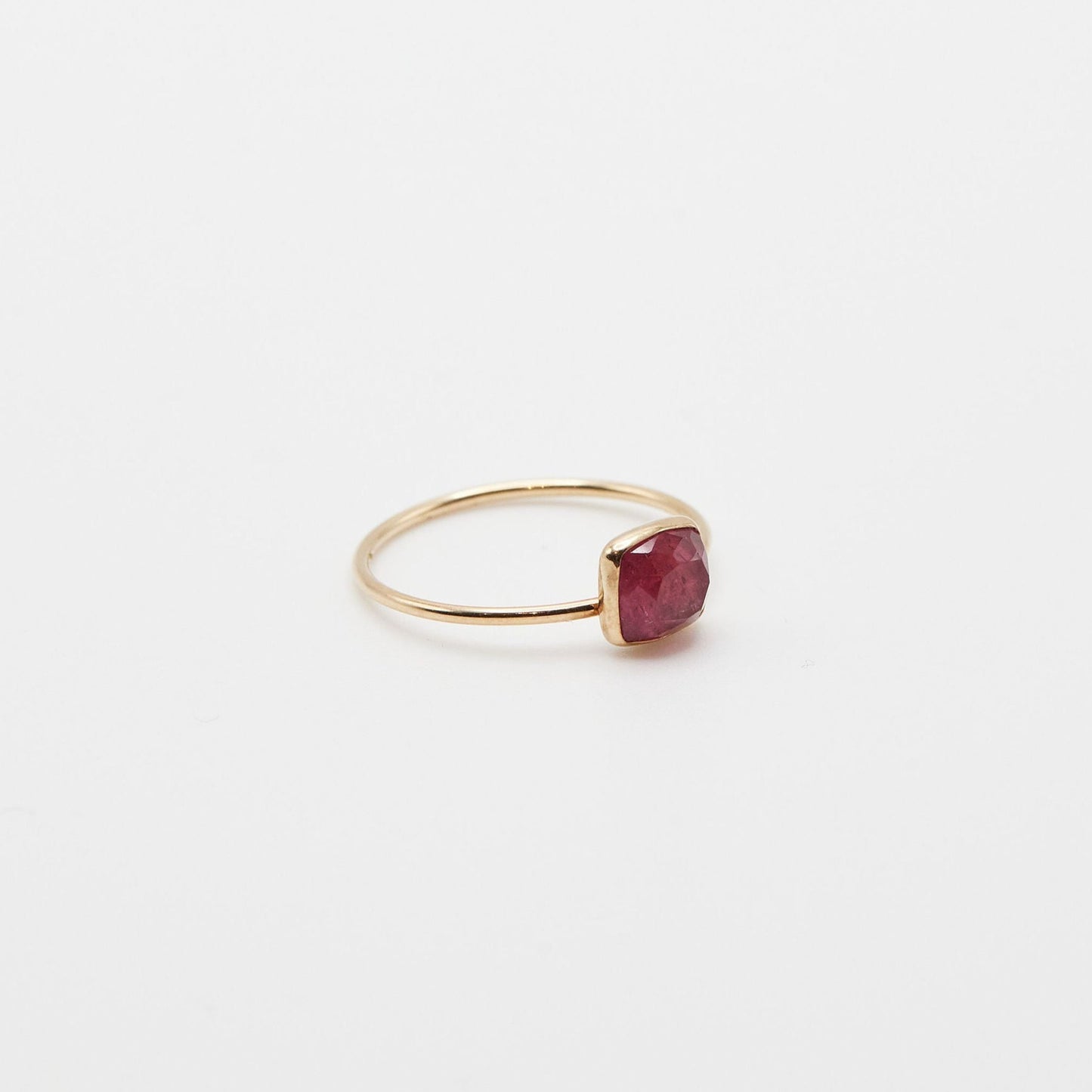 angled side view of the square pink tourmaline ring