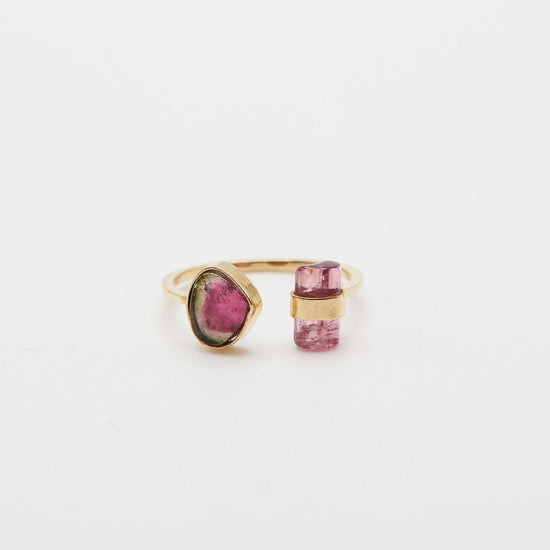 split pink and watermelon tourmaline ring on white background
