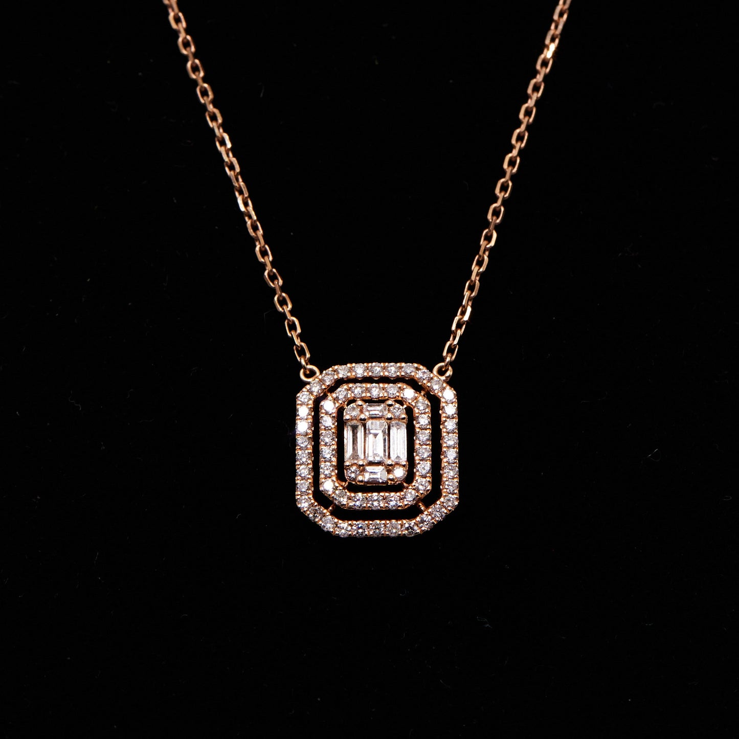double halo diamond necklace on black background