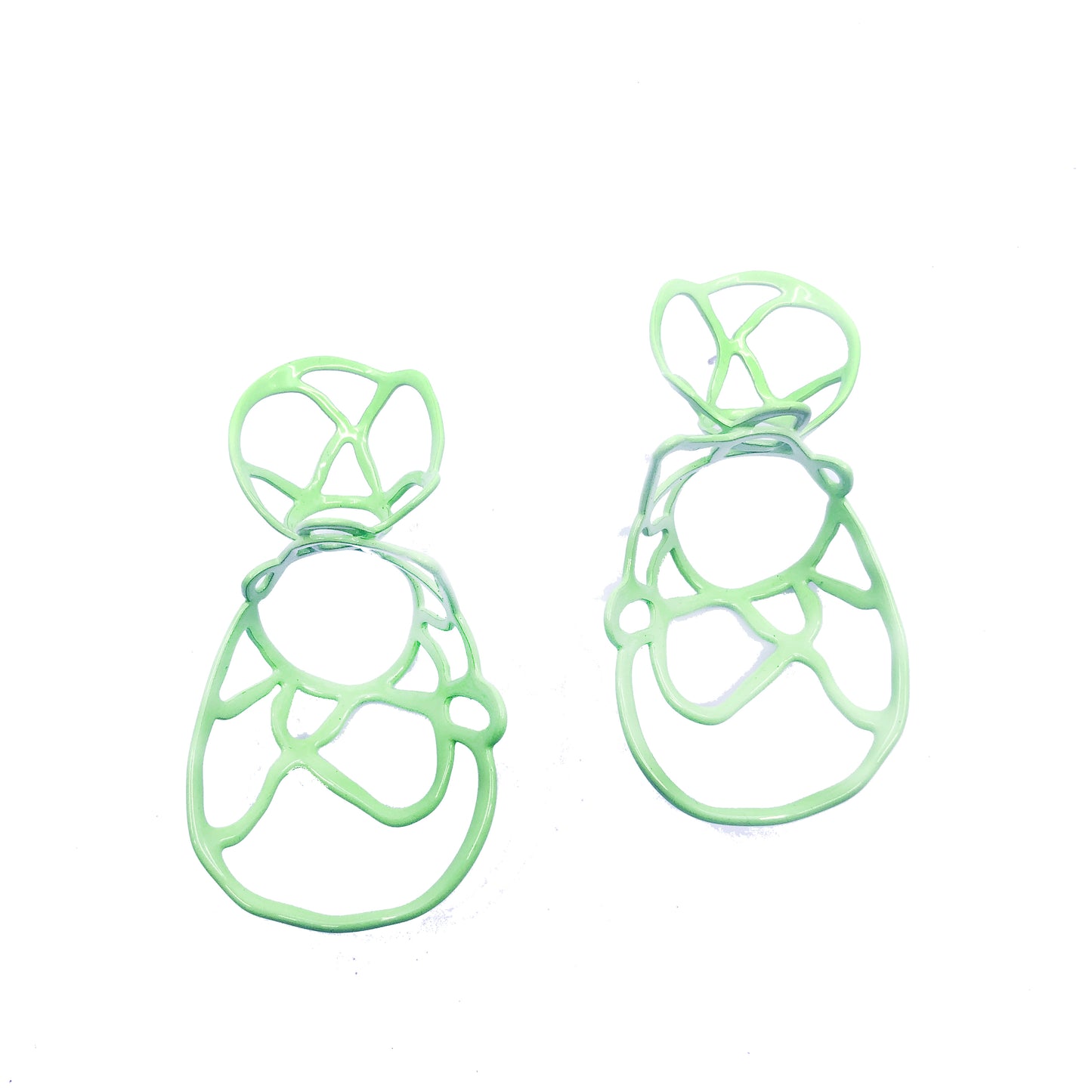Mint sculptural double lace statement earrings on white background.
