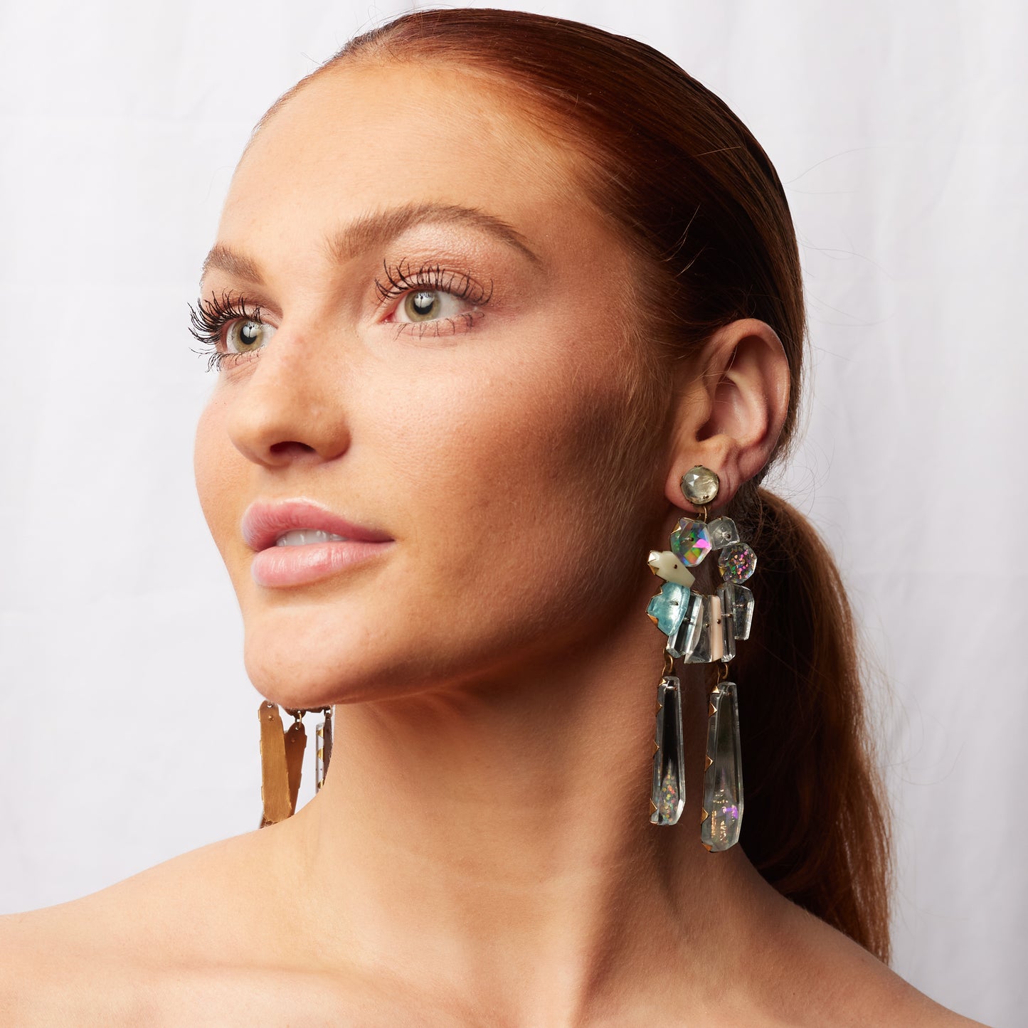 model wearing the silver neogem drop earrings