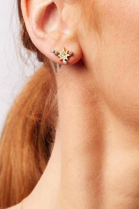 model wearing the stella stud earrings