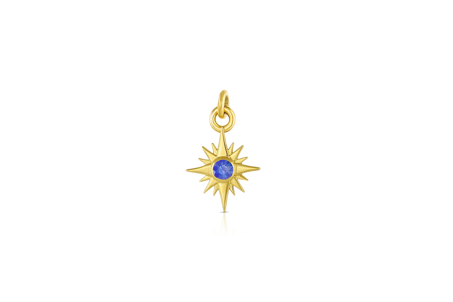 18k yellow gold star charm with blue sapphire center stone on white background.